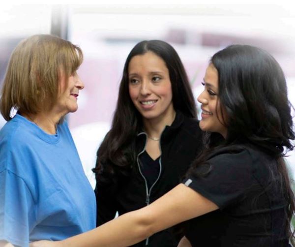 Group of women standing and talking