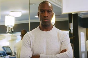 El atleta olímpico Michael Johnson